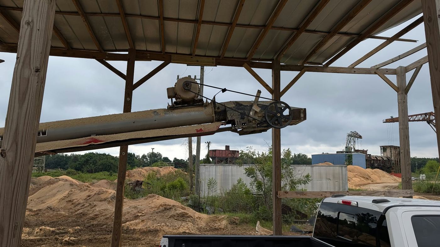 The conveyor in context at the pellet plant, drive mounted on top.