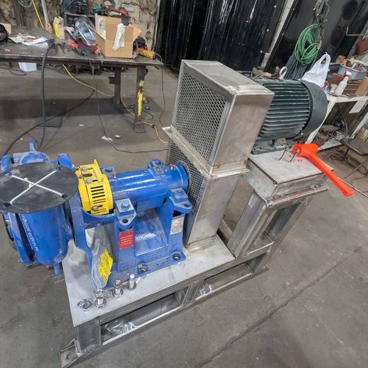 Stainless pump stand with the pump low and the motor raised behind it.