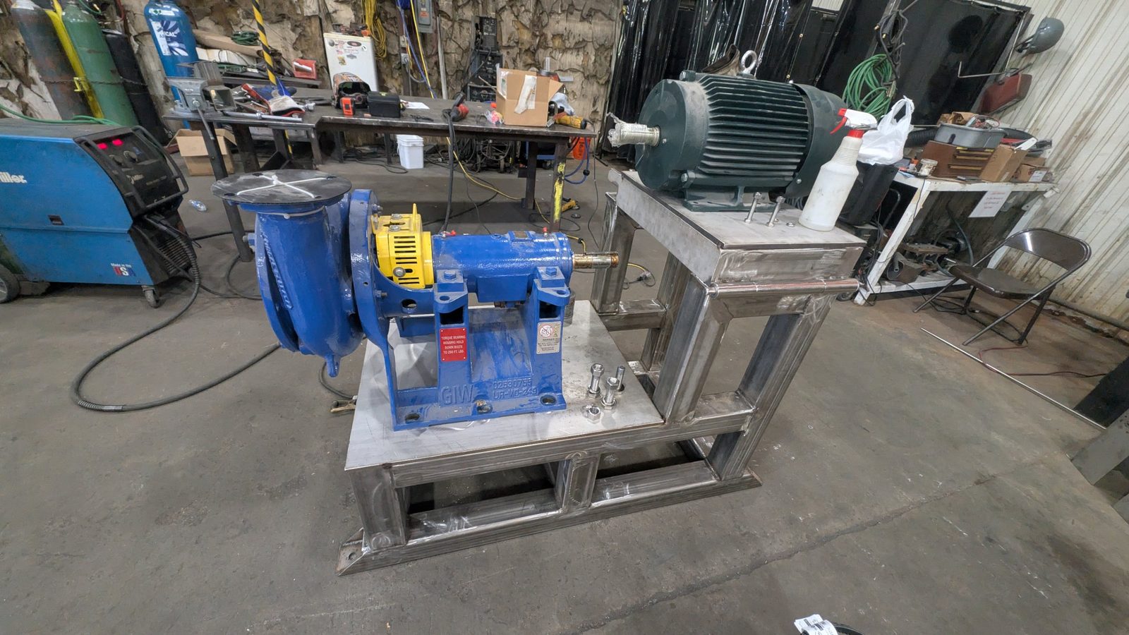 The assembled pump and motor on the stainless stand before the guard was fitted.