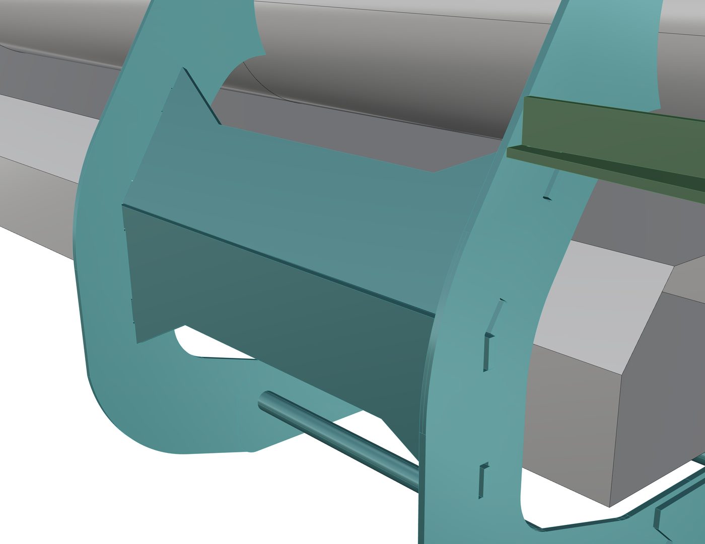 Close view of panel tabs passing through slots in the curved saddle yoke arms.