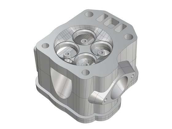 Shaded model of a four-valve cylinder head showing the combustion chamber, valve seats and port runs.